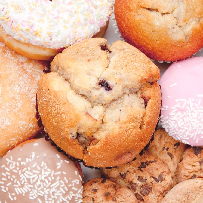 Close-up of Cakes, Muffins, and Doughnuts - Bakery - AAK