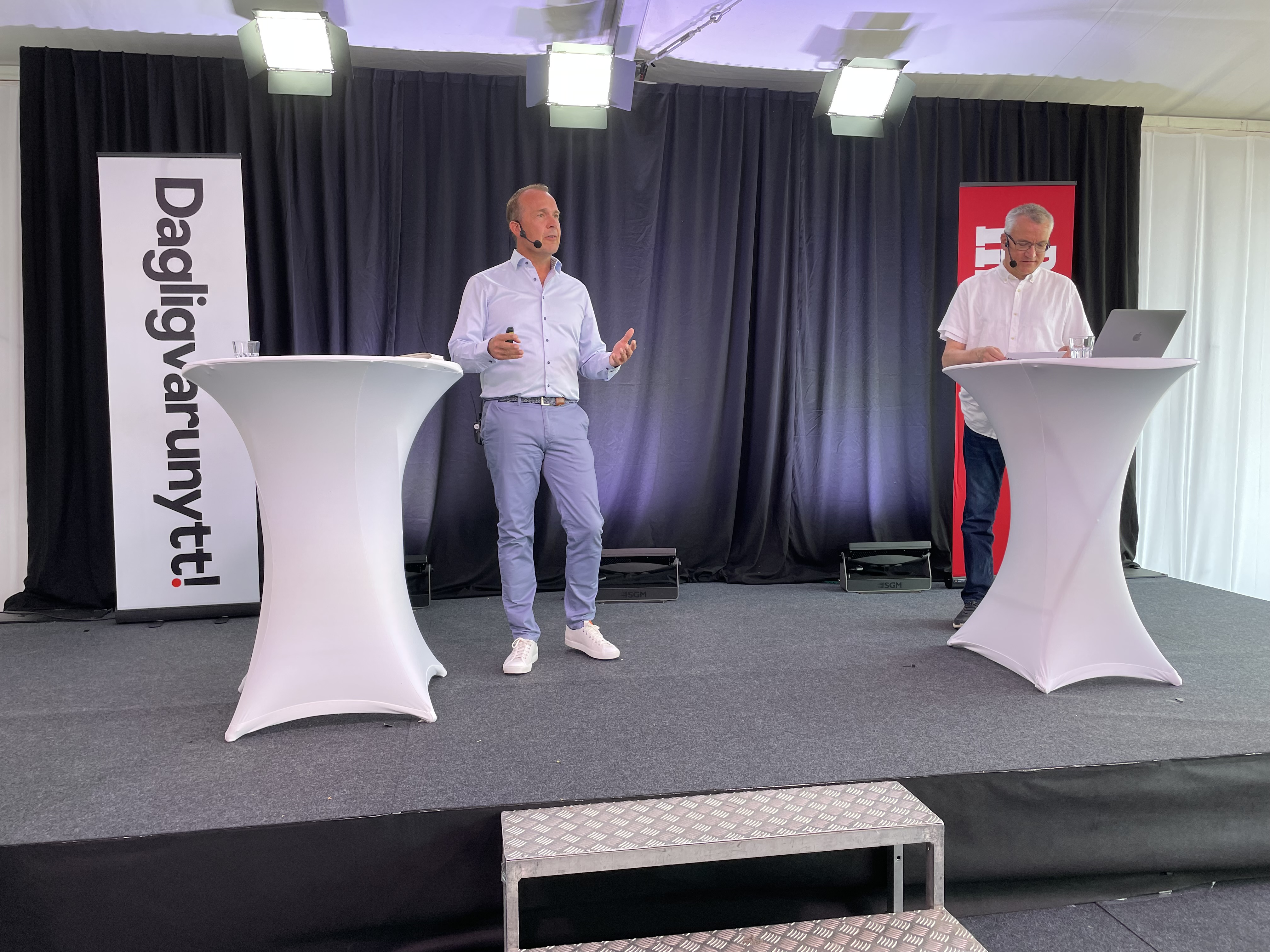 CEO, Johan Westman speaking on a stage.