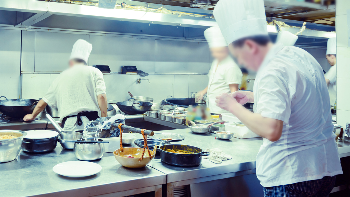 Busy Kitchen with Chefs Cooking Food - Foodservice and Retail - AAK