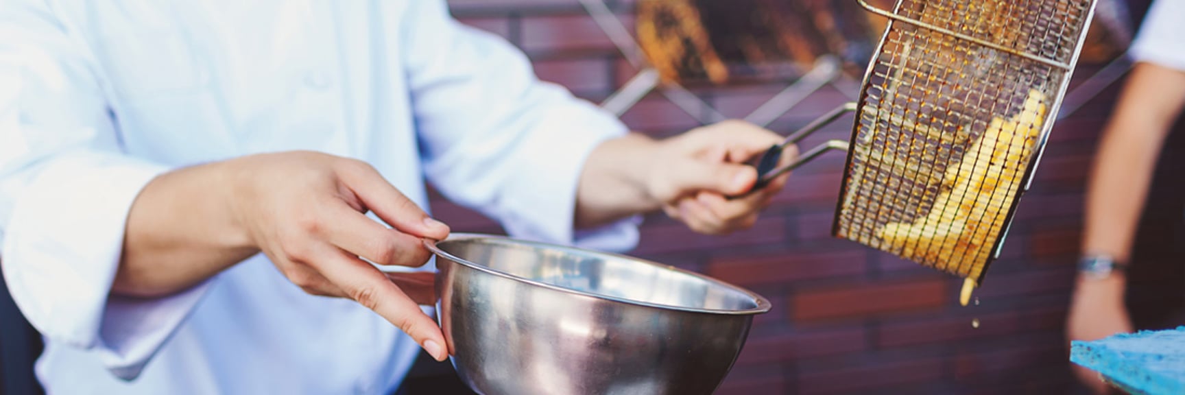 Close-up of Fried Potato Chips in Oil - Foodservice and Retail - AAK