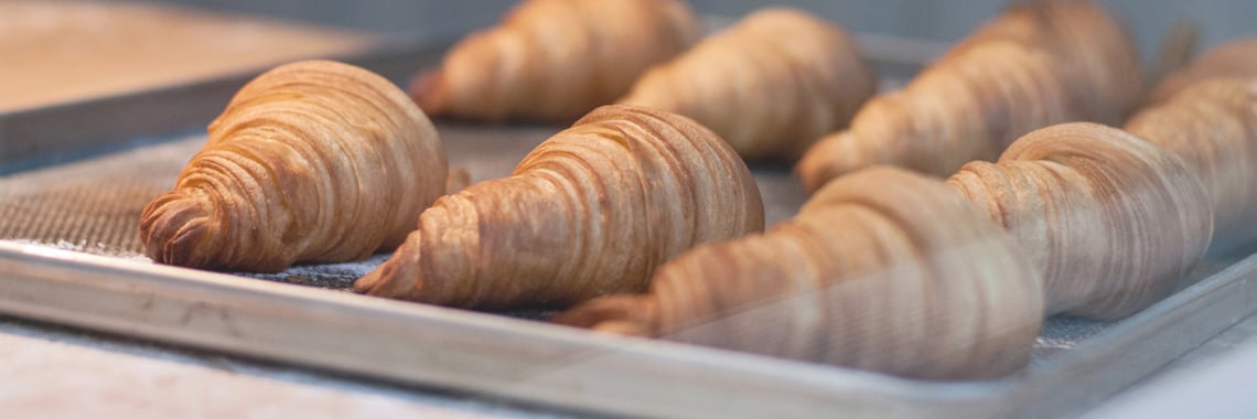 Croissants Laying on an Oven Sheet - Bakery - AAK